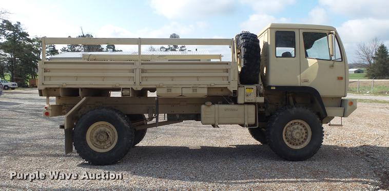 image for item DE3596 1997 Stewart Stevenson M-1078 flatbed truck