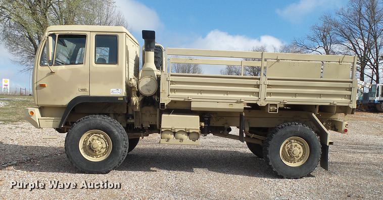 image for item DE3596 1997 Stewart Stevenson M-1078 flatbed truck