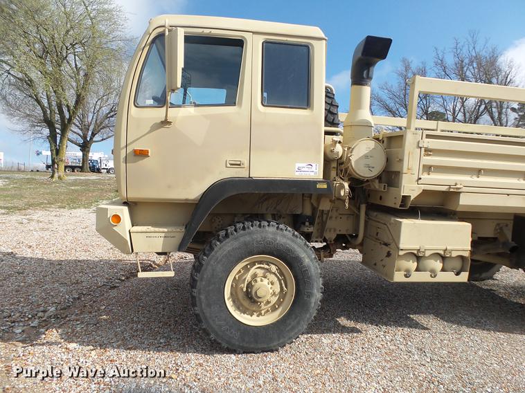 image for item DE3596 1997 Stewart Stevenson M-1078 flatbed truck