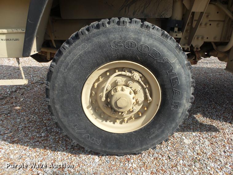 image for item DE3596 1997 Stewart Stevenson M-1078 flatbed truck