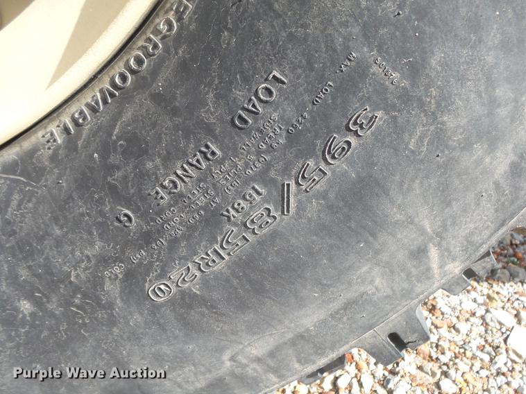 image for item DE3596 1997 Stewart Stevenson M-1078 flatbed truck