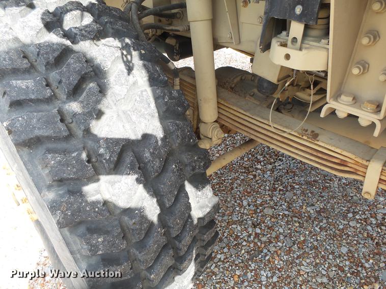 image for item DE3596 1997 Stewart Stevenson M-1078 flatbed truck