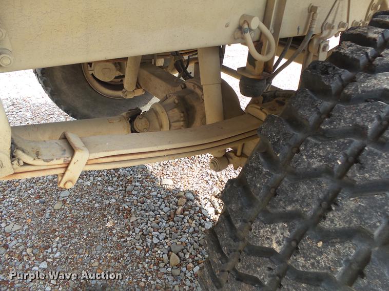 image for item DE3596 1997 Stewart Stevenson M-1078 flatbed truck