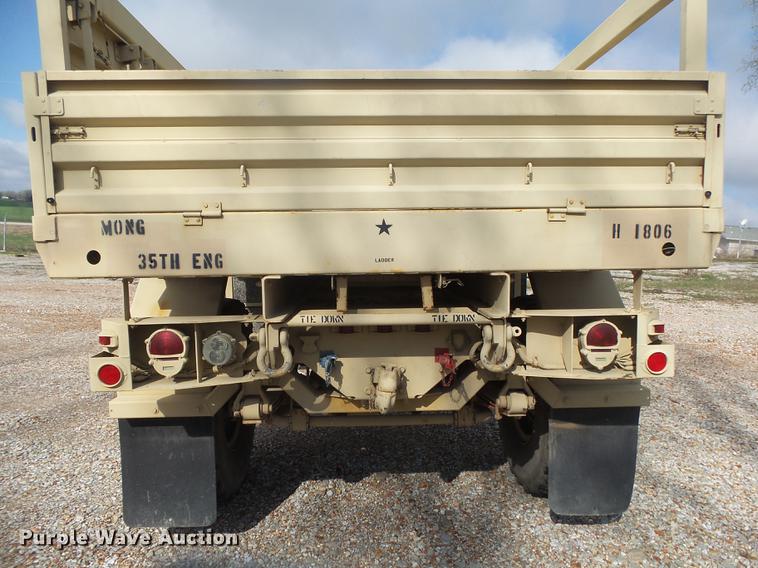 image for item DE3596 1997 Stewart Stevenson M-1078 flatbed truck