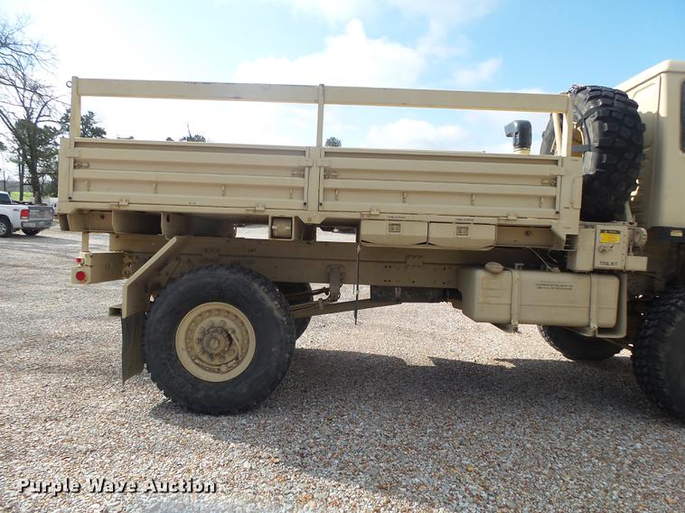 image for item DE3596 1997 Stewart Stevenson M-1078 flatbed truck