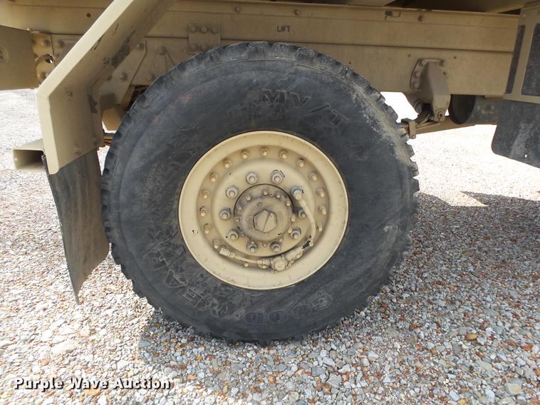 image for item DE3596 1997 Stewart Stevenson M-1078 flatbed truck