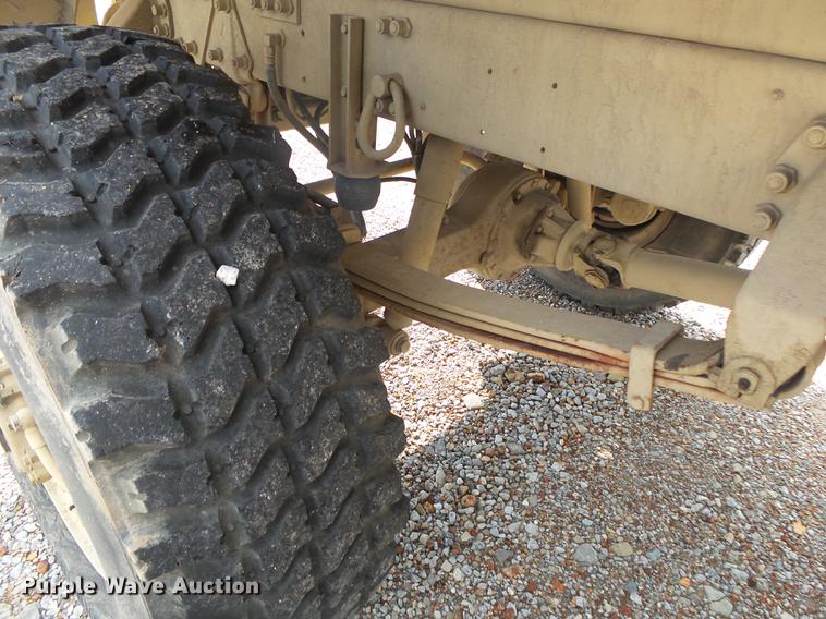 image for item DE3596 1997 Stewart Stevenson M-1078 flatbed truck