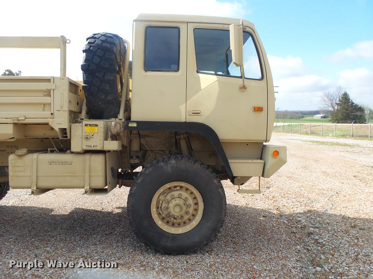 image for item DE3596 1997 Stewart Stevenson M-1078 flatbed truck