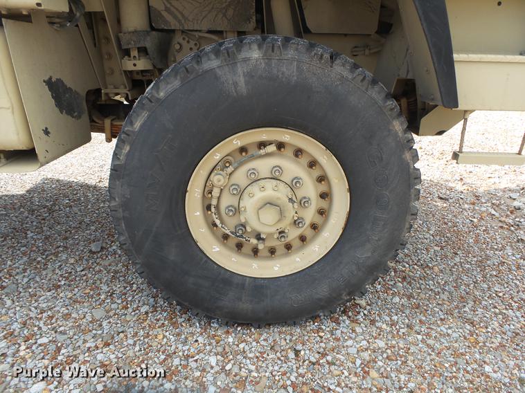 image for item DE3596 1997 Stewart Stevenson M-1078 flatbed truck