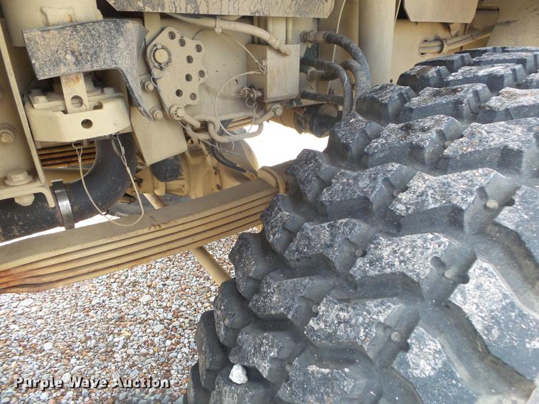 image for item DE3596 1997 Stewart Stevenson M-1078 flatbed truck