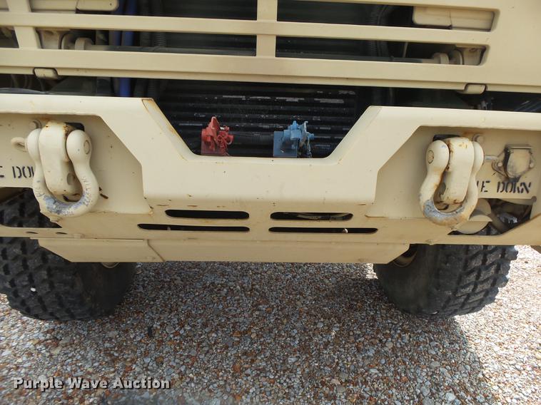 image for item DE3596 1997 Stewart Stevenson M-1078 flatbed truck