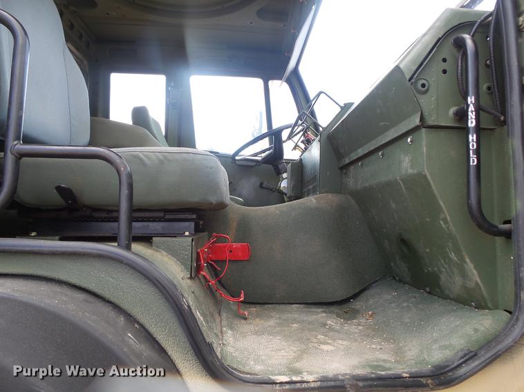 image for item DE3596 1997 Stewart Stevenson M-1078 flatbed truck