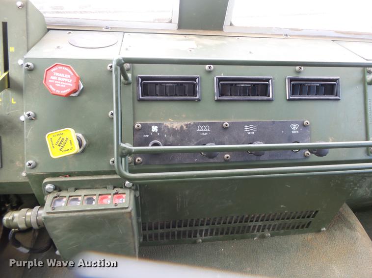 image for item DE3596 1997 Stewart Stevenson M-1078 flatbed truck