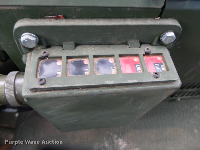 image for item DE3596 1997 Stewart Stevenson M-1078 flatbed truck