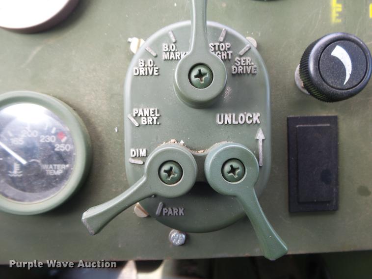 image for item DE3596 1997 Stewart Stevenson M-1078 flatbed truck