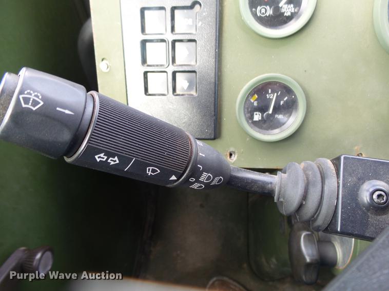 image for item DE3596 1997 Stewart Stevenson M-1078 flatbed truck