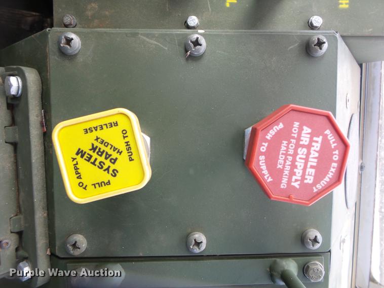 image for item DE3596 1997 Stewart Stevenson M-1078 flatbed truck