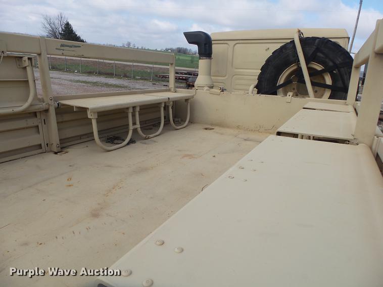 image for item DE3596 1997 Stewart Stevenson M-1078 flatbed truck