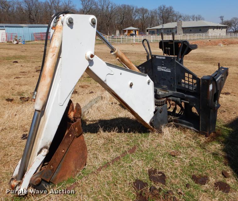 image for item EJ9836 Bobcat 709 skid steer backhoe attachment