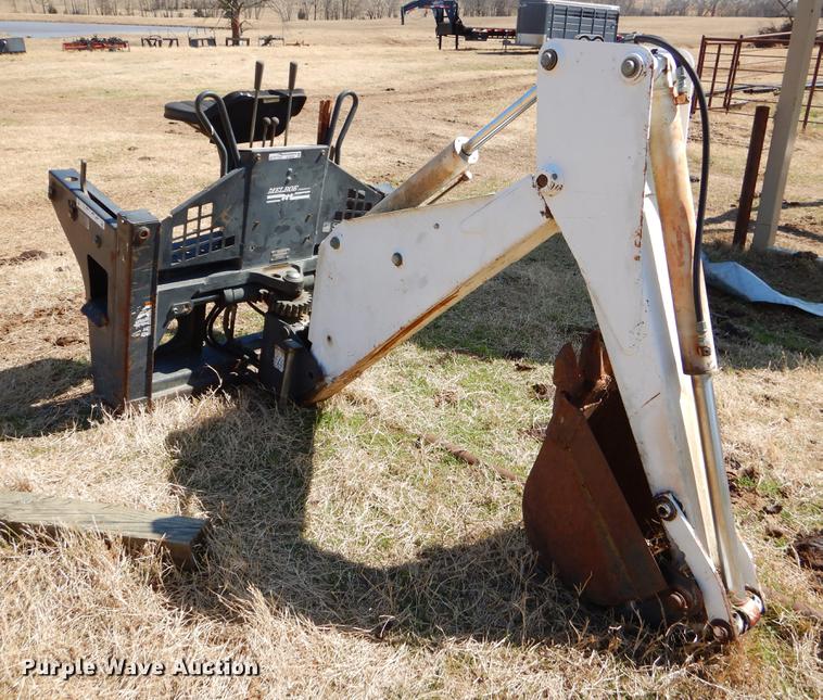 image for item EJ9836 Bobcat 709 skid steer backhoe attachment