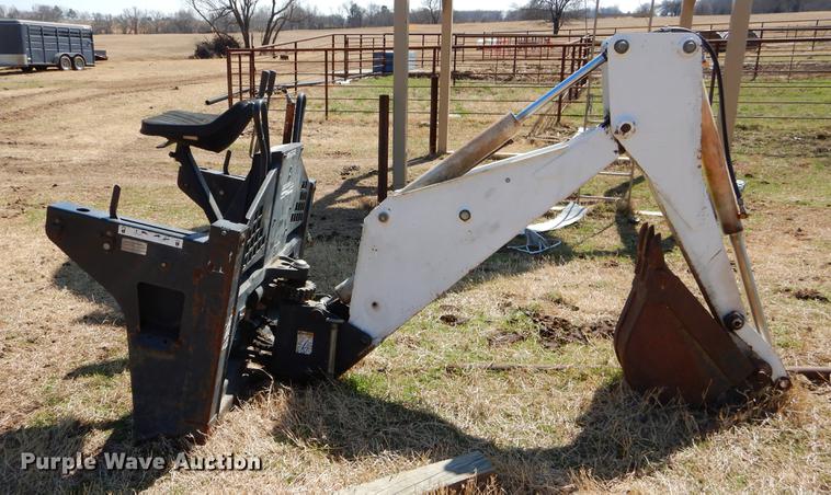 image for item EJ9836 Bobcat 709 skid steer backhoe attachment