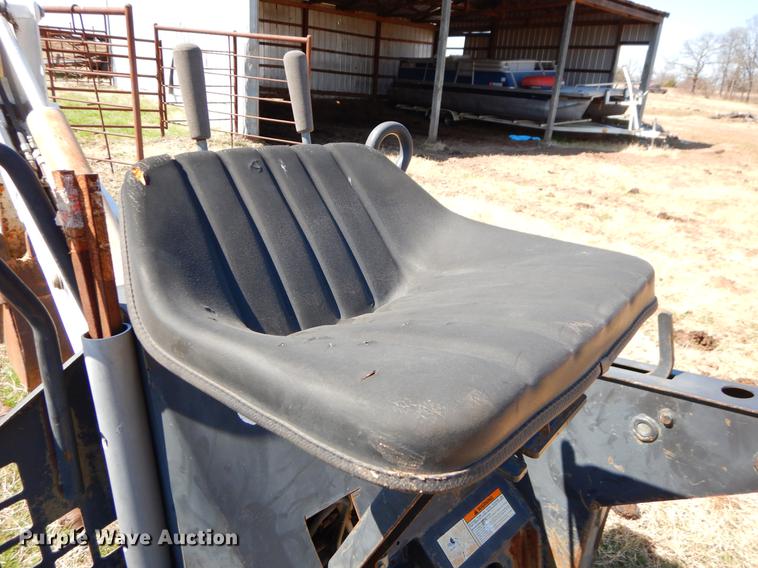 image for item EJ9836 Bobcat 709 skid steer backhoe attachment