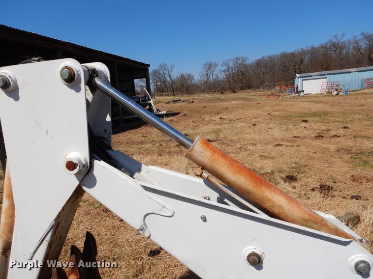 image for item EJ9836 Bobcat 709 skid steer backhoe attachment