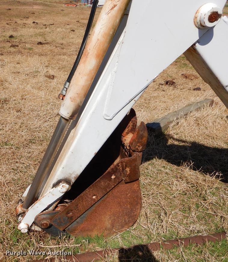 image for item EJ9836 Bobcat 709 skid steer backhoe attachment