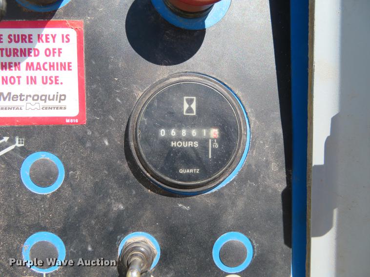 image for item DC0906 1996 Genie S60 boom lift