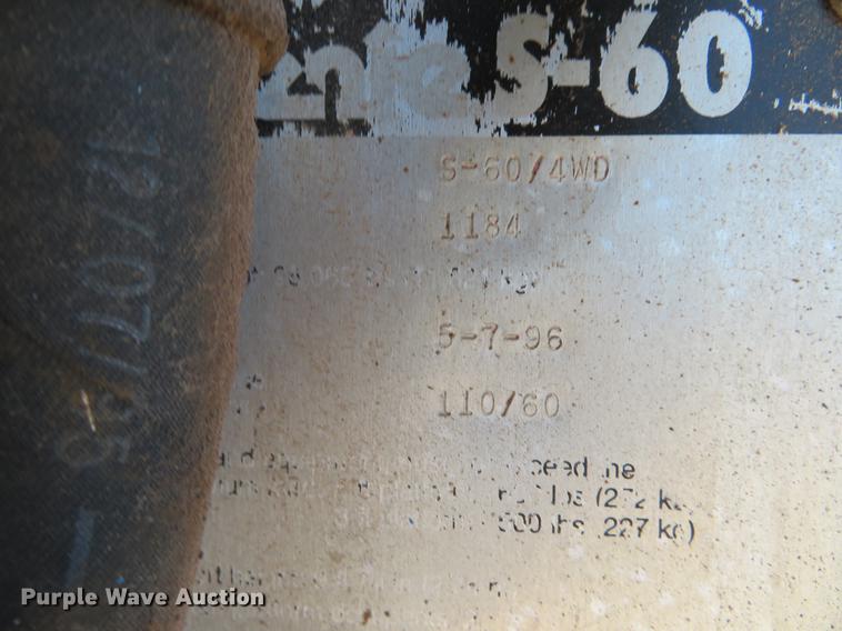 image for item DC0906 1996 Genie S60 boom lift