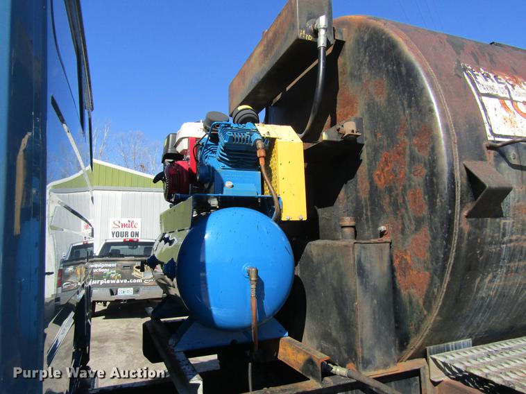 image for item DC4394 1998 Freightliner FL70 seal coat truck