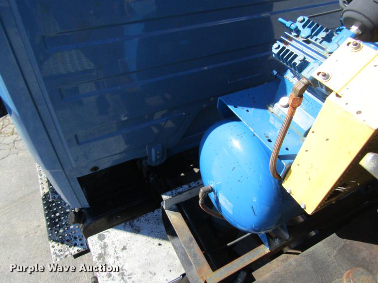 image for item DC4394 1998 Freightliner FL70 seal coat truck