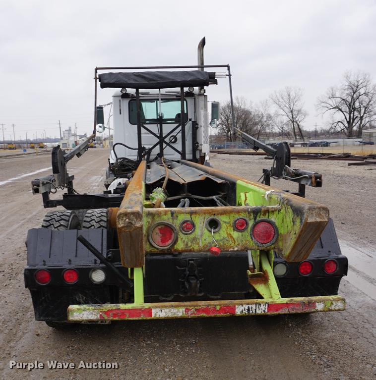 image for item DE3195 1999 Mack CH613 roll-off container truck