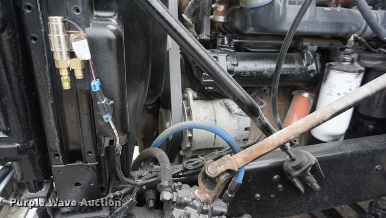 image for item DE3195 1999 Mack CH613 roll-off container truck