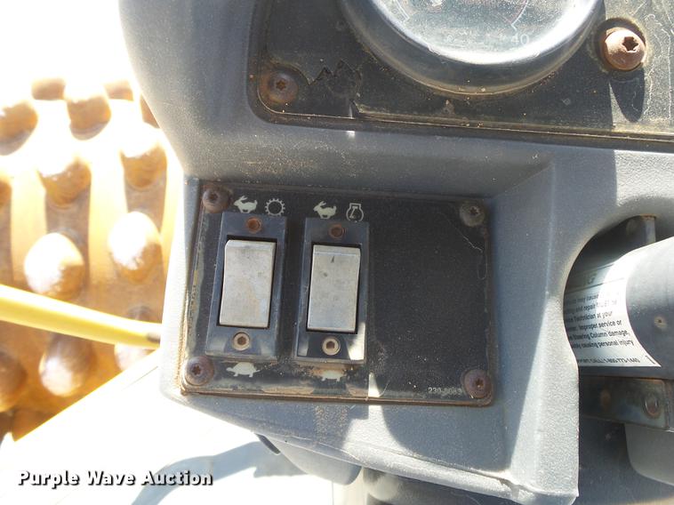 image for item DE3583 2004 Caterpillar CP-563E single drum vibratory roller