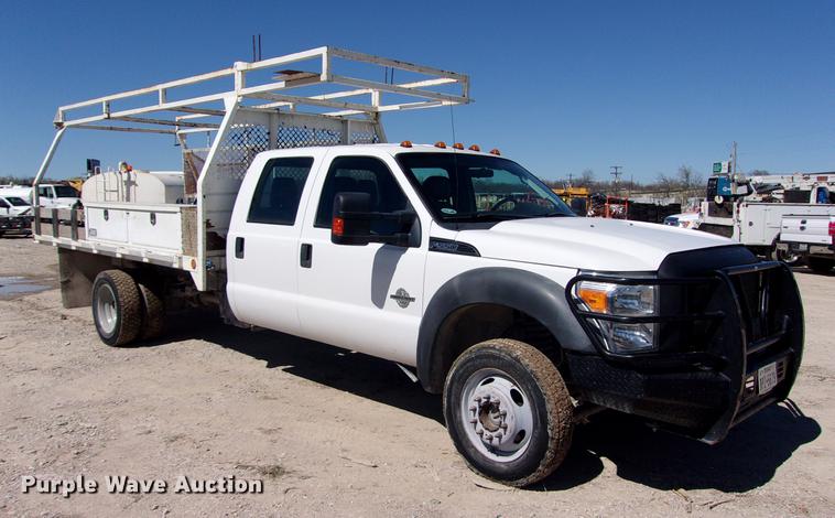 image for item DK9904 2011 Ford F550 Super Duty Crew Cab flatbed truck