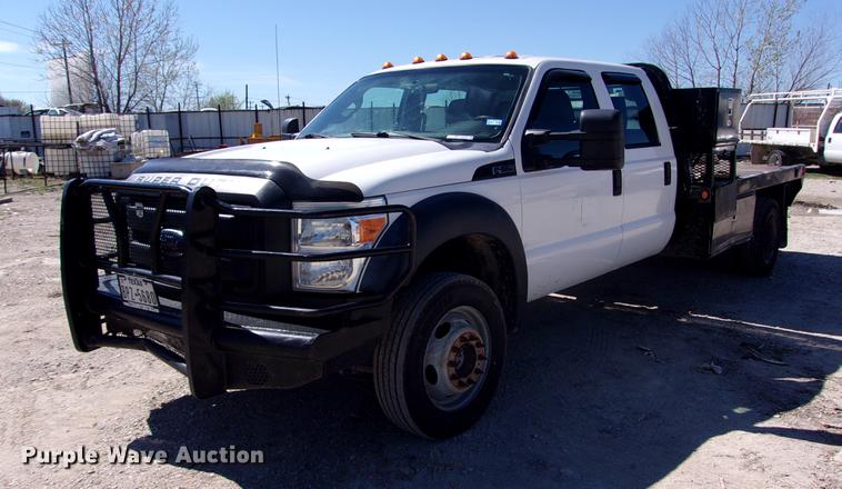 image for item DK9905 2011 Ford F550 Super Duty Crew Cab flatbed truck