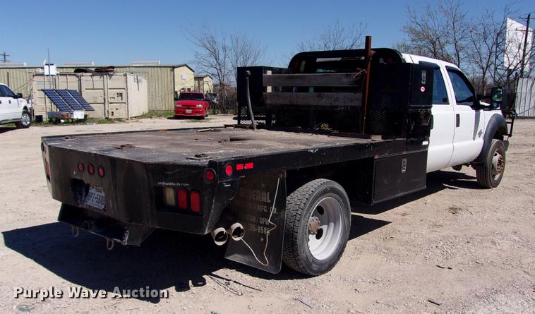image for item DK9905 2011 Ford F550 Super Duty Crew Cab flatbed truck