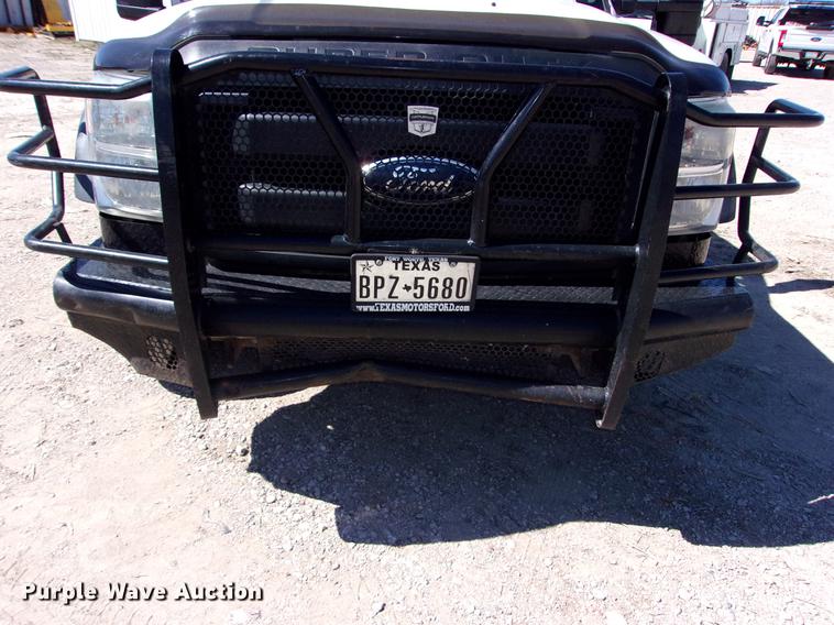 image for item DK9905 2011 Ford F550 Super Duty Crew Cab flatbed truck