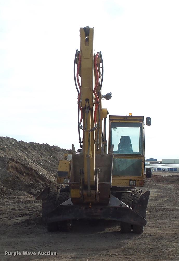 image for item DV9673 1985 Caterpillar 206 rubber tire excavator