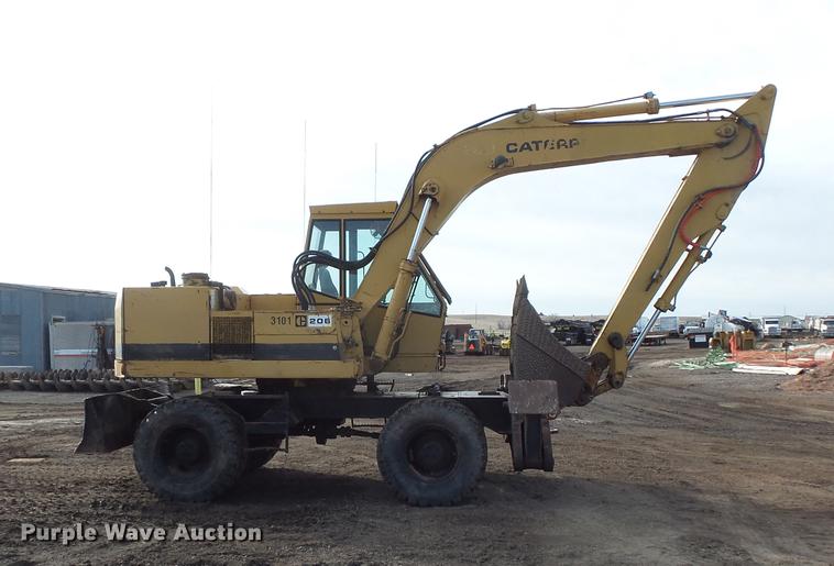 image for item DV9673 1985 Caterpillar 206 rubber tire excavator
