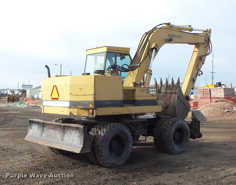 image for item DV9673 1985 Caterpillar 206 rubber tire excavator