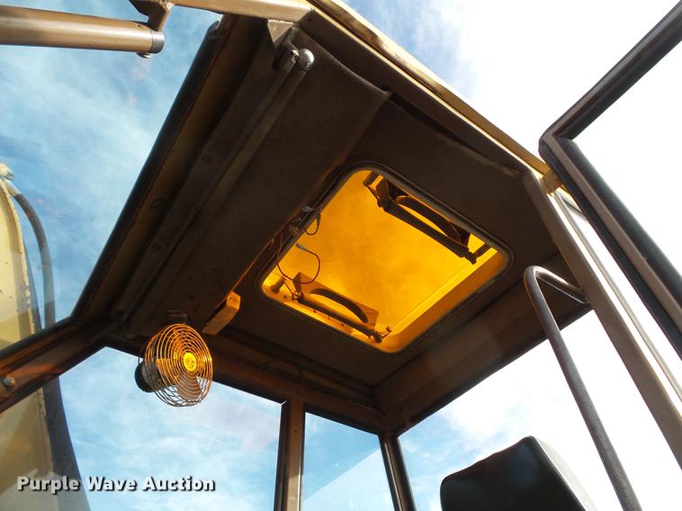 image for item DV9673 1985 Caterpillar 206 rubber tire excavator