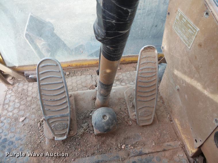 image for item DV9673 1985 Caterpillar 206 rubber tire excavator