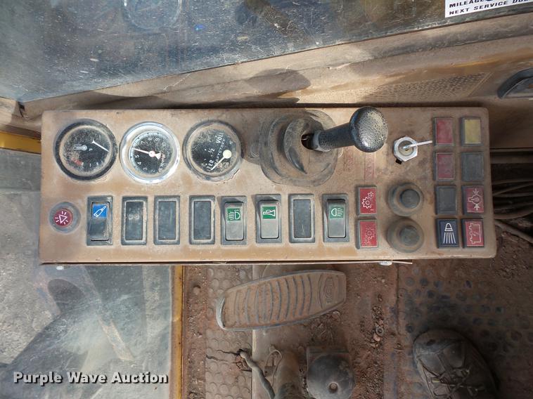 image for item DV9673 1985 Caterpillar 206 rubber tire excavator