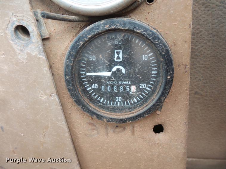 image for item DV9673 1985 Caterpillar 206 rubber tire excavator