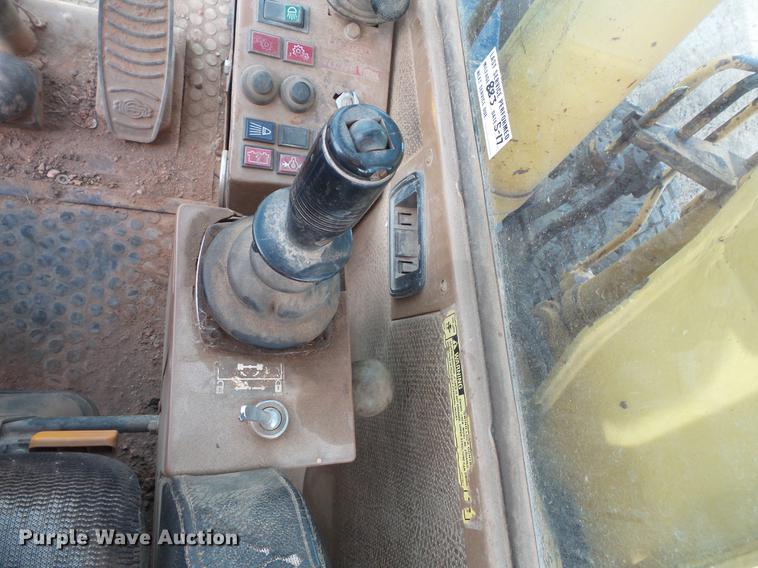 image for item DV9673 1985 Caterpillar 206 rubber tire excavator