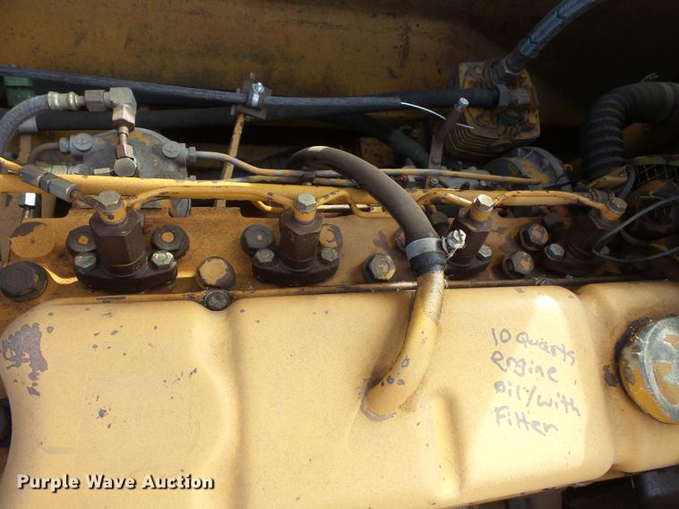 image for item DV9673 1985 Caterpillar 206 rubber tire excavator