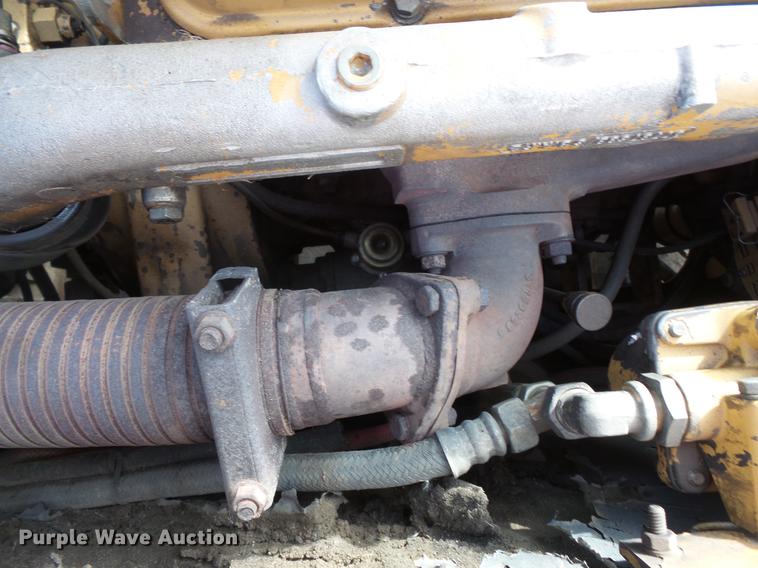 image for item DV9673 1985 Caterpillar 206 rubber tire excavator