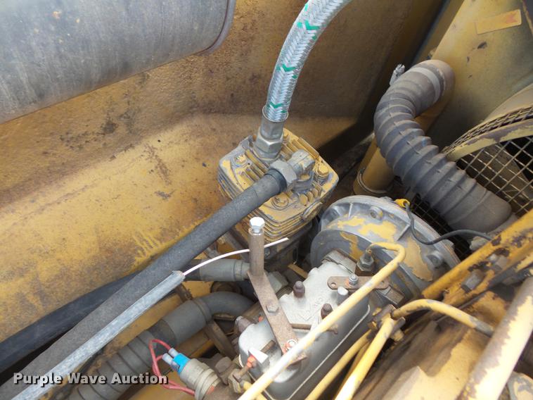 image for item DV9673 1985 Caterpillar 206 rubber tire excavator